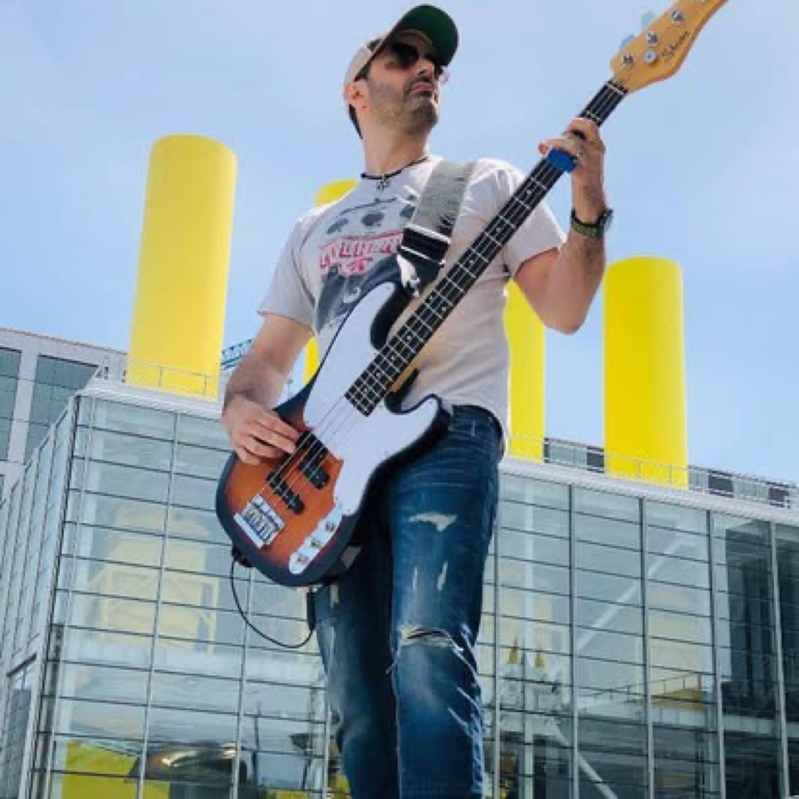 Bassist on an outdoor stage